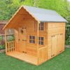 7x8 Shire Crib Kids Two-Storey Wooden Playhouse with veranda, garage doors, and shutters