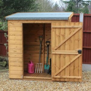 Rustic stone shed with timber door