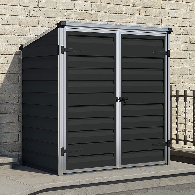 5' x 3' Palram Compact plastic shed next to patio area