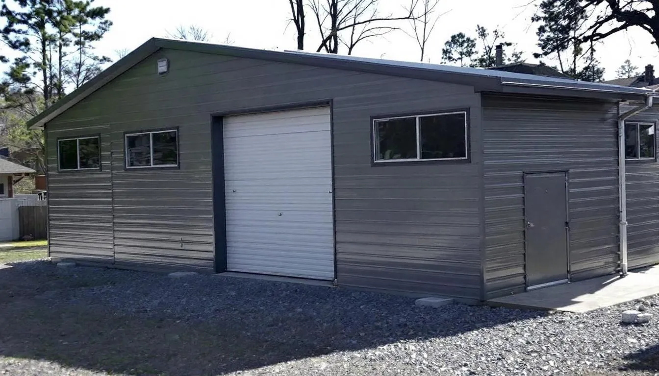 The image depicts a medium-sized steel storage building featuring multiple access doors and windows, showcasing its versatile design suitable for various uses such as agricultural storage or as a metal shed for garden tools. The durable structure is constructed from high-quality galvanized steel, ensuring long-lasting protection and security for stored items.